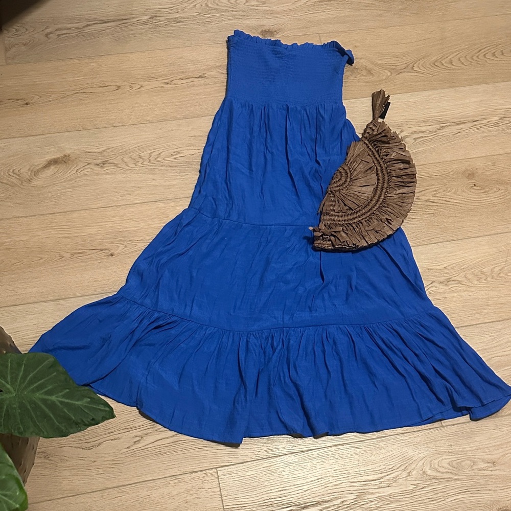 Blue Strapless Dress with Brown Clutch